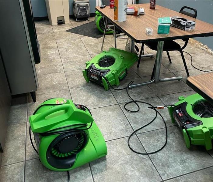 Commercial Water Damage Equipment in saturated breakroom 