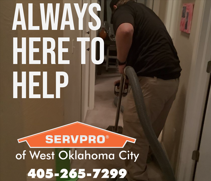 Water Damage 24/7 Emergency Services in Oklahoma City - image of technician cleaning